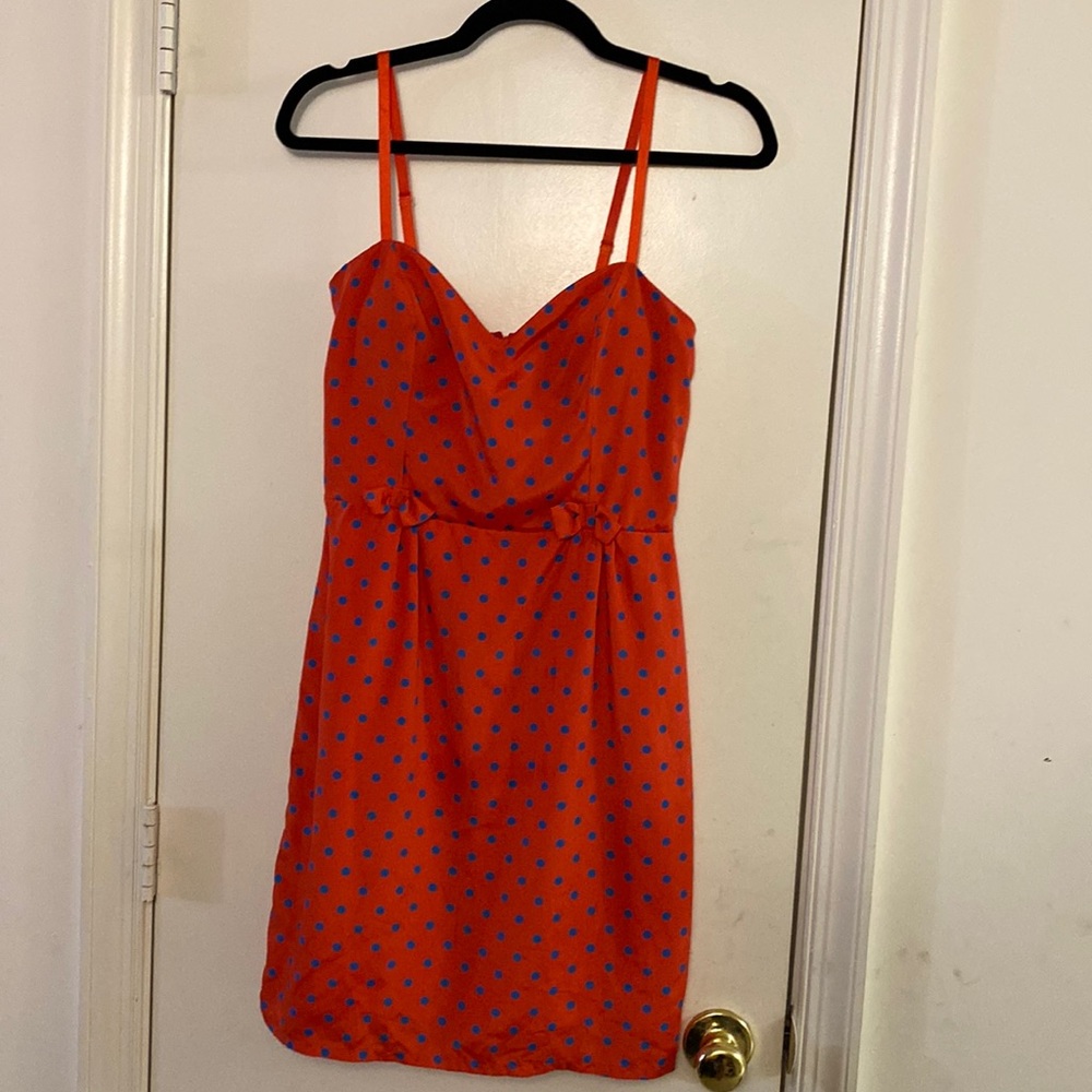 Red dress with blue polka dots